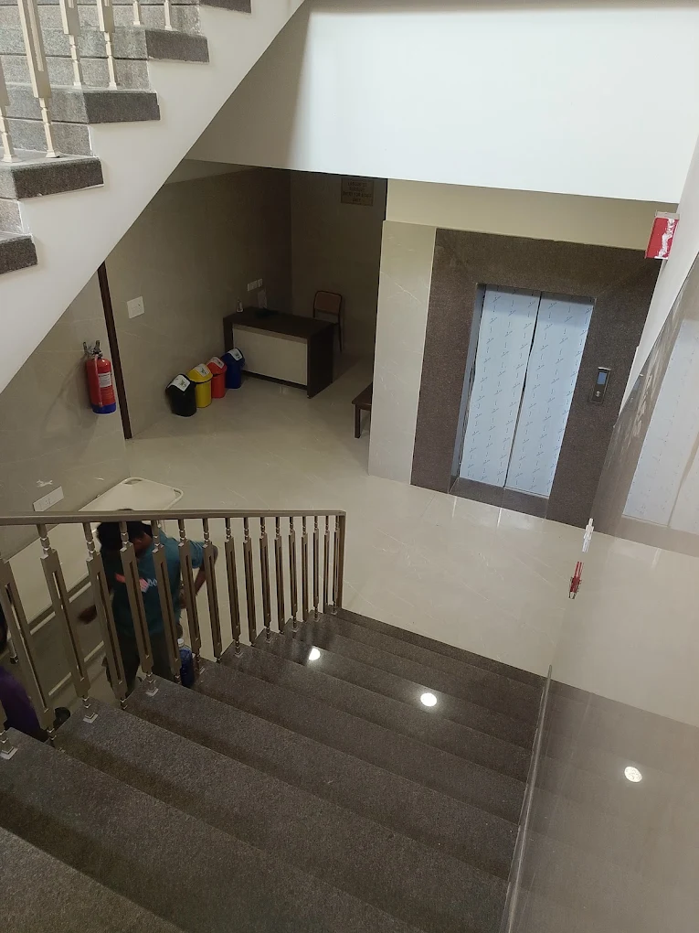 Staircase and lift area inside Phoenix Hospital
